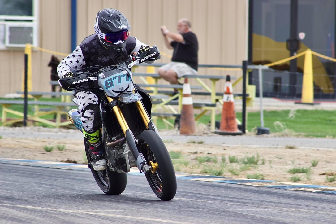 Supermoto rider photographed on a racetrack